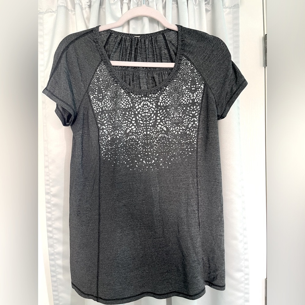 Lulu lemon active tee with Reflective floral print .